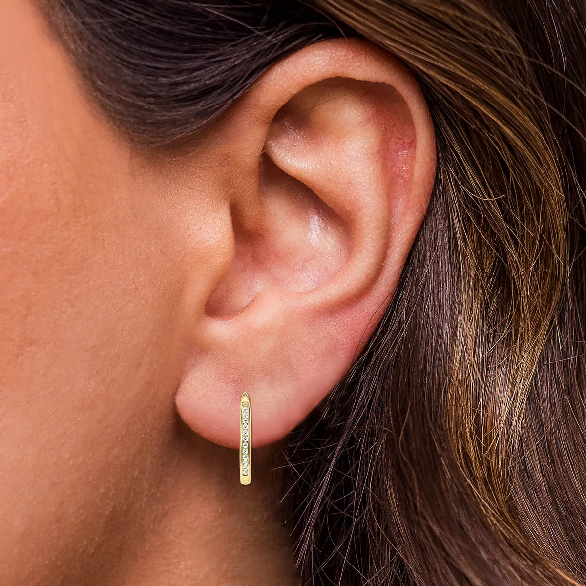 1/4 Carat TW Channel Set Diamond Hoop Earrings in 10K Yellow Gold