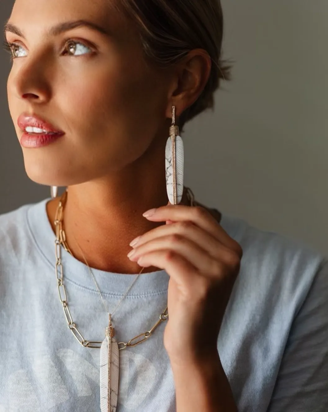14k Carved Howlite Feather Earrings