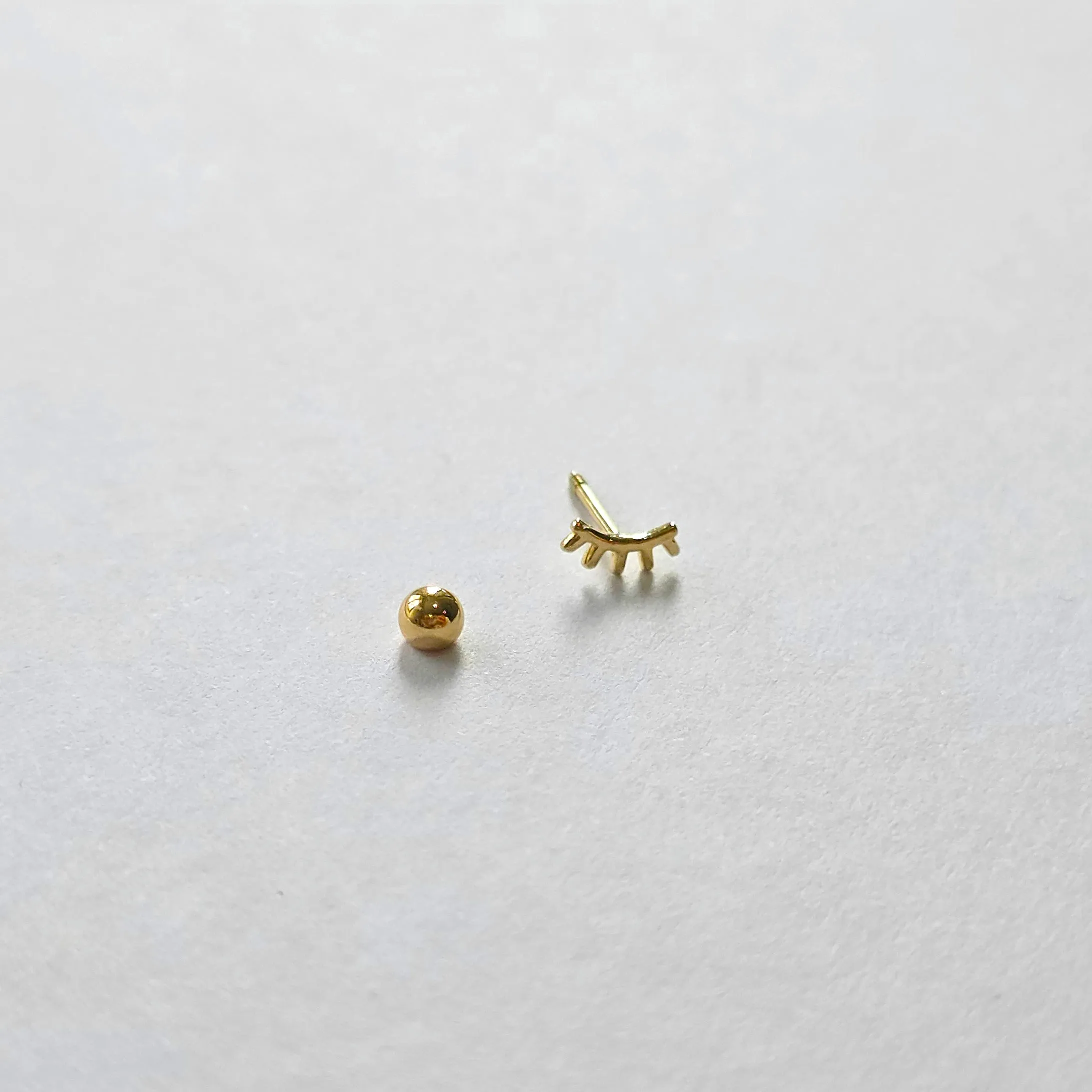 14K Eyelash Cartilage Earring