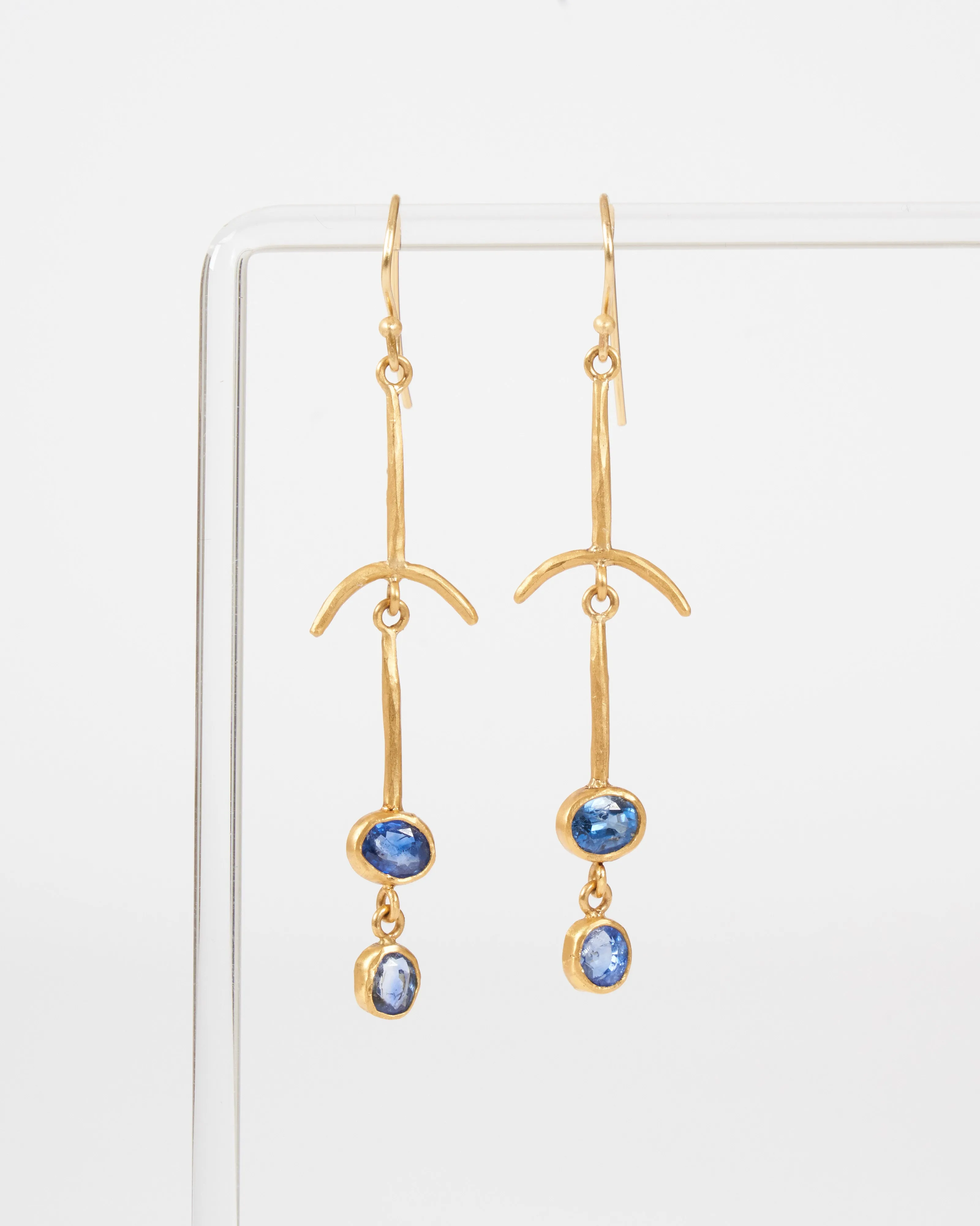 blue sapphire drop bone earrings