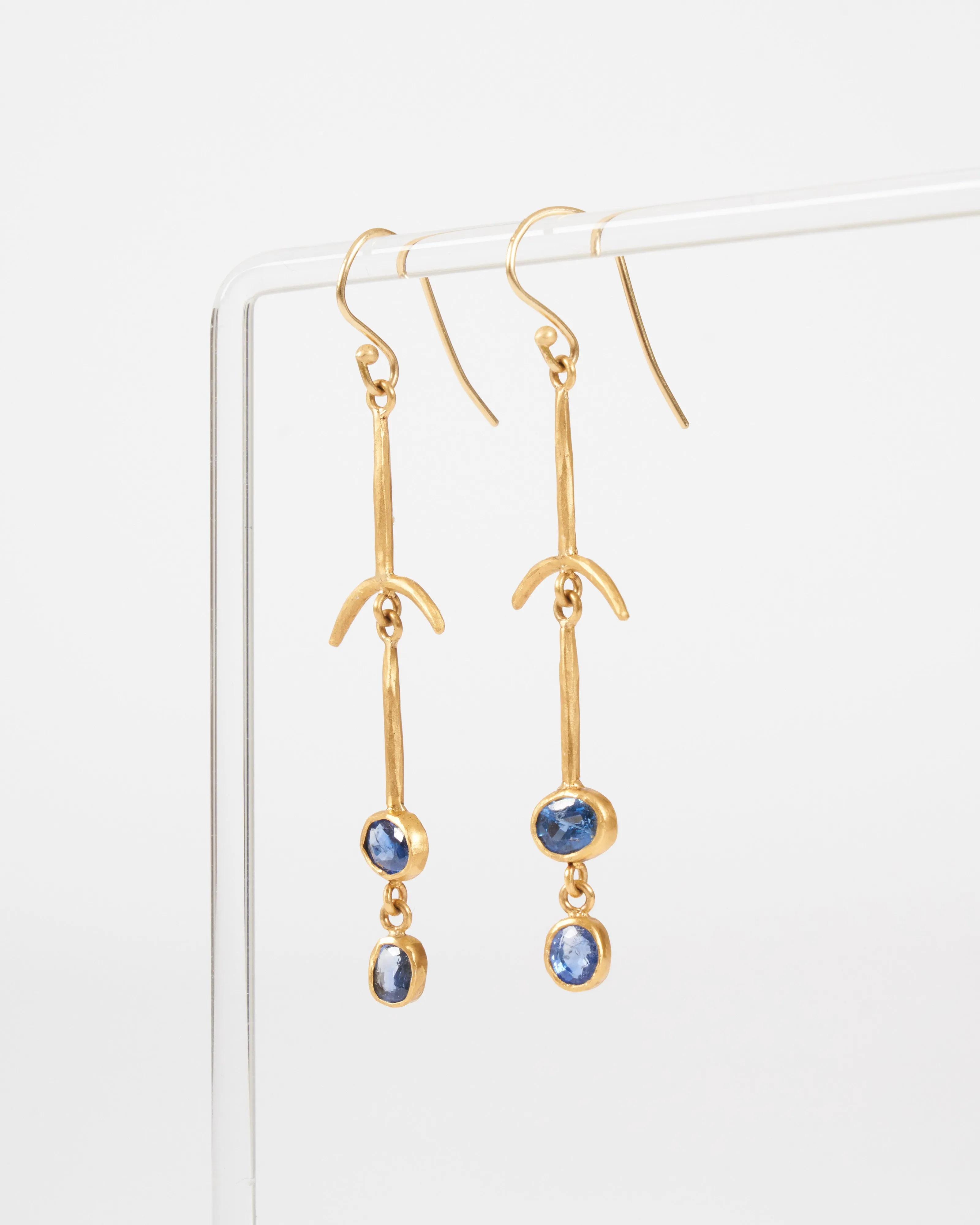 blue sapphire drop bone earrings