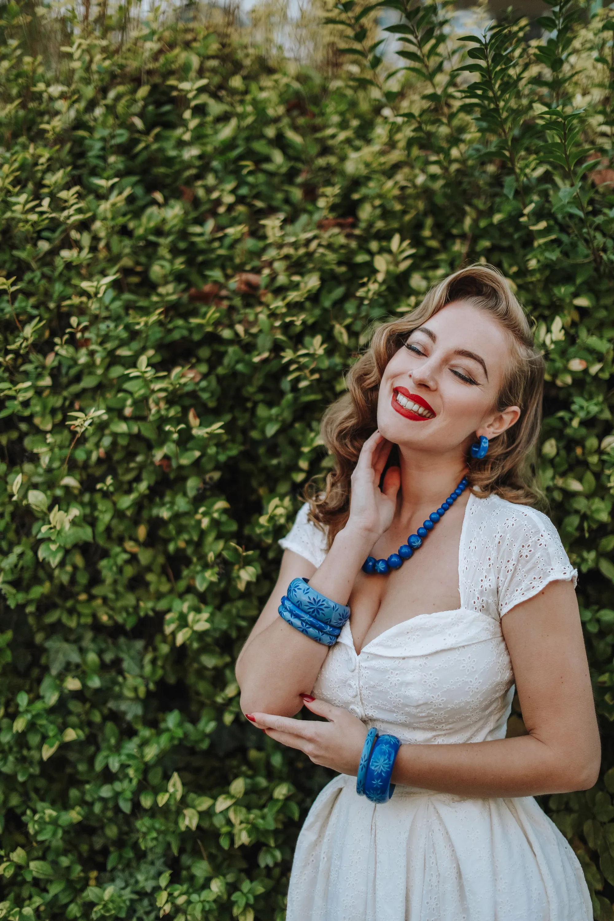 Cornflower Carved Drop Hoop Earrings