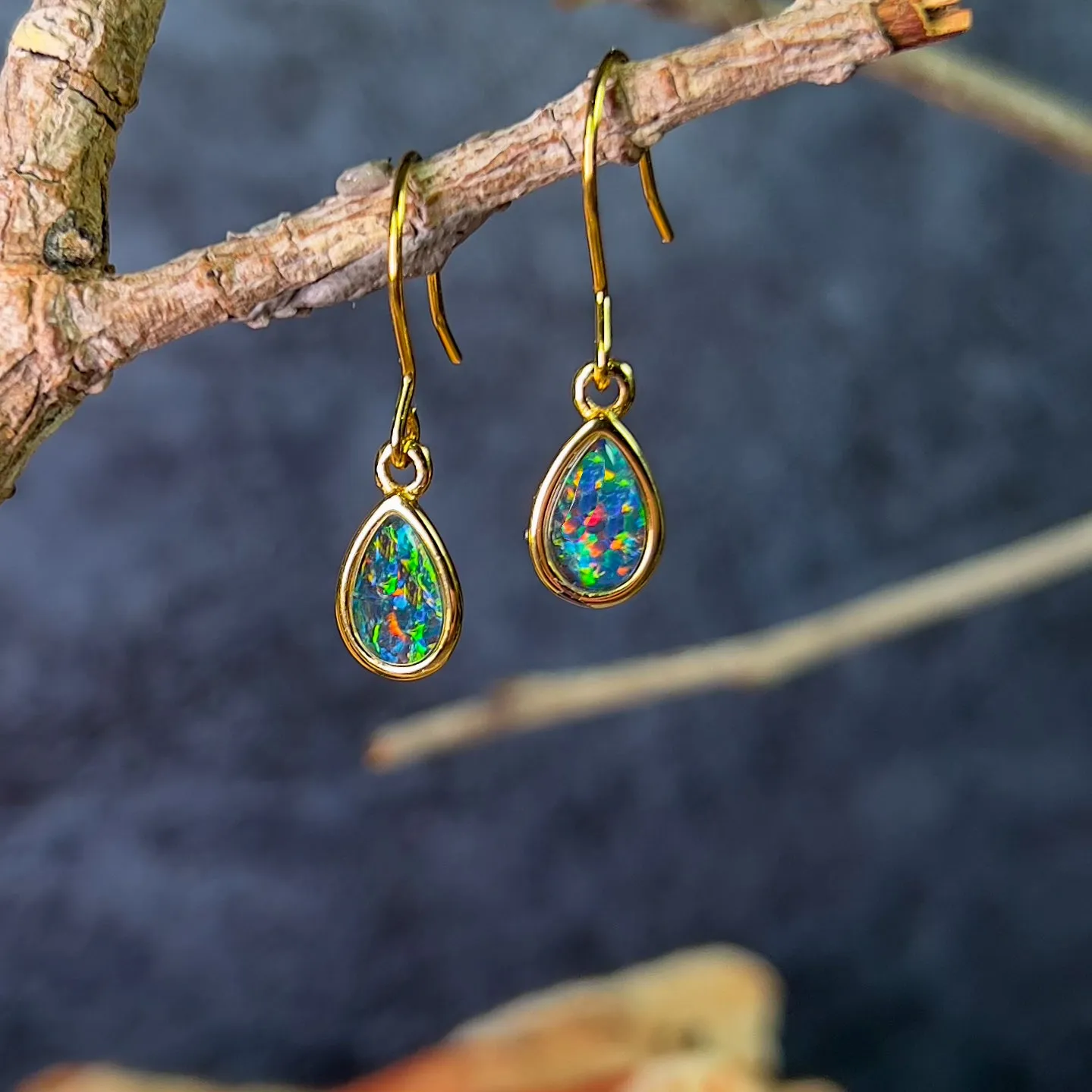 Gold Plated pear shape dangling silver earrings with Opal triplets 8x6mm
