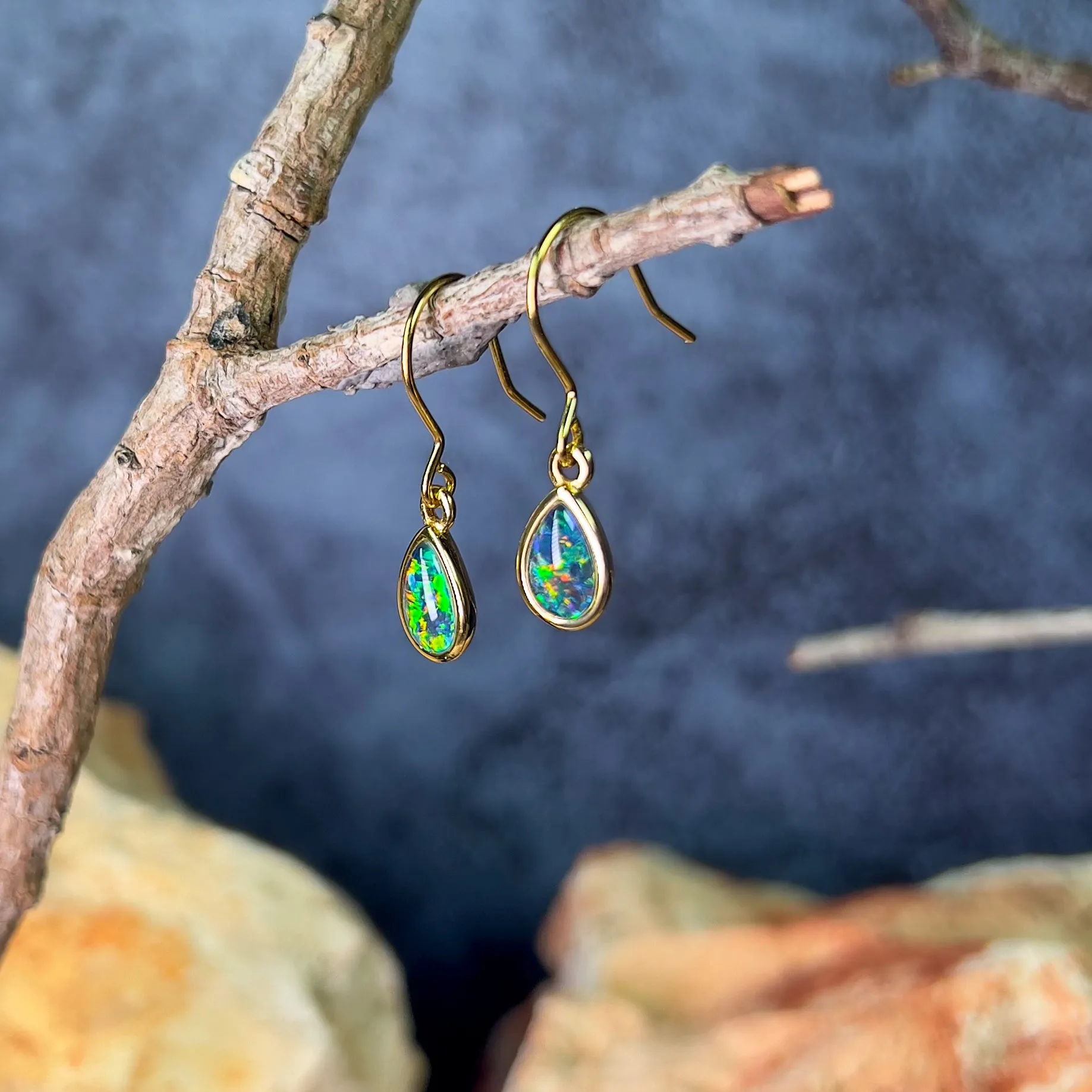 Gold Plated pear shape dangling silver earrings with Opal triplets 8x6mm