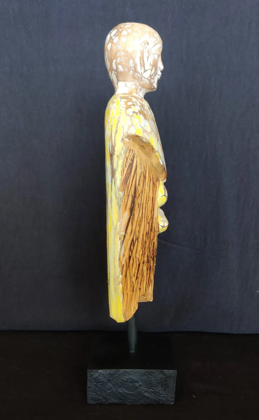 Home Decor.
Contemporary Serene Buddhist Monk Wooden Statue mounted on a rustic wooden base.