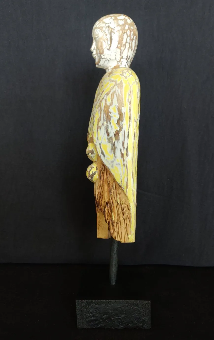 Home Decor.
Contemporary Serene Buddhist Monk Wooden Statue mounted on a rustic wooden base.