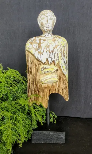 Home Decor.
Contemporary Serene Buddhist Monk Wooden Statue mounted on a rustic wooden base.