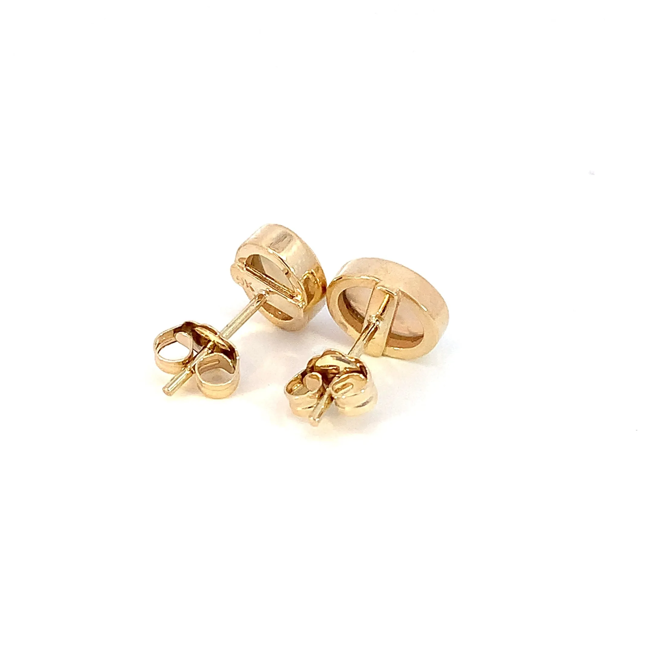 One pair of 9kt Yellow Gold Light Opal earring studs 7x5mm bezel set