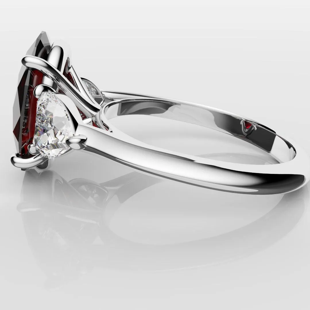 Oval Ruby and Heart Diamond Trilogy Engagement Ring
