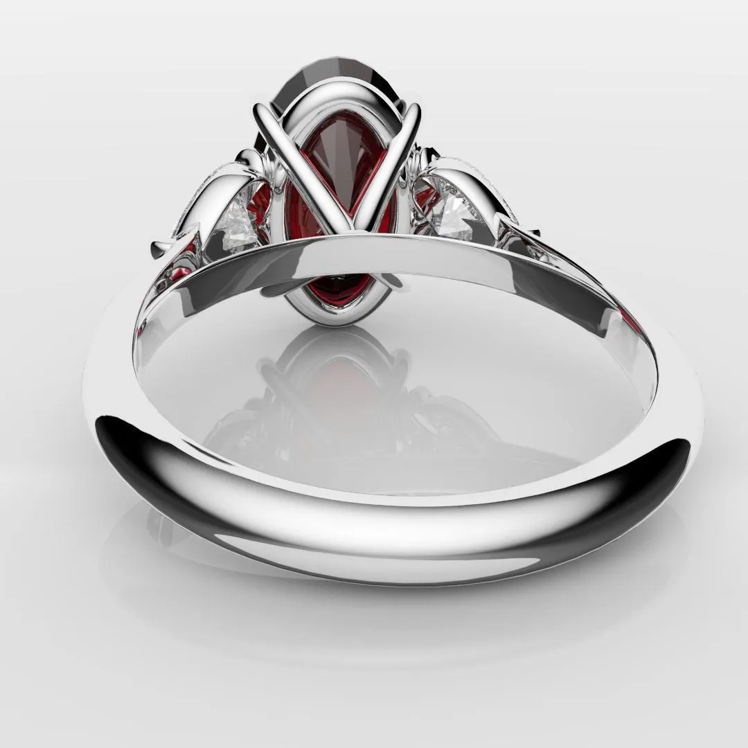 Oval Ruby and Heart Diamond Trilogy Engagement Ring