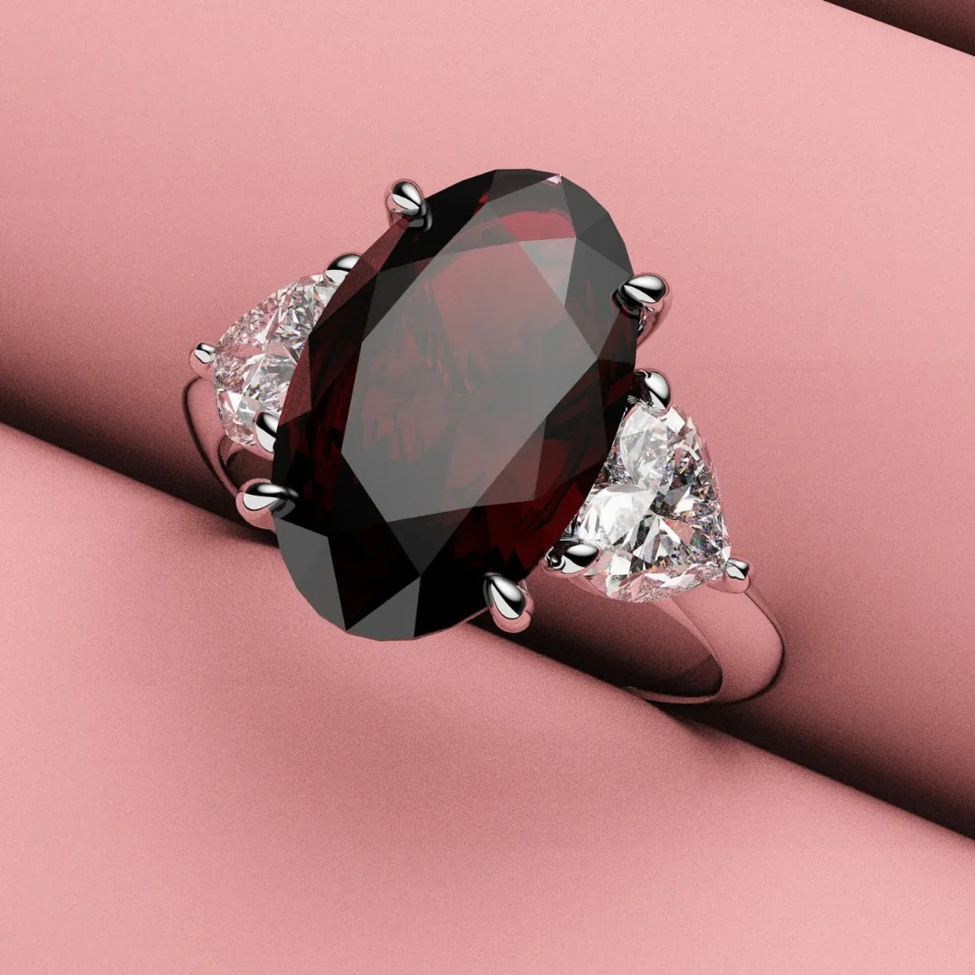 Oval Ruby and Heart Diamond Trilogy Engagement Ring