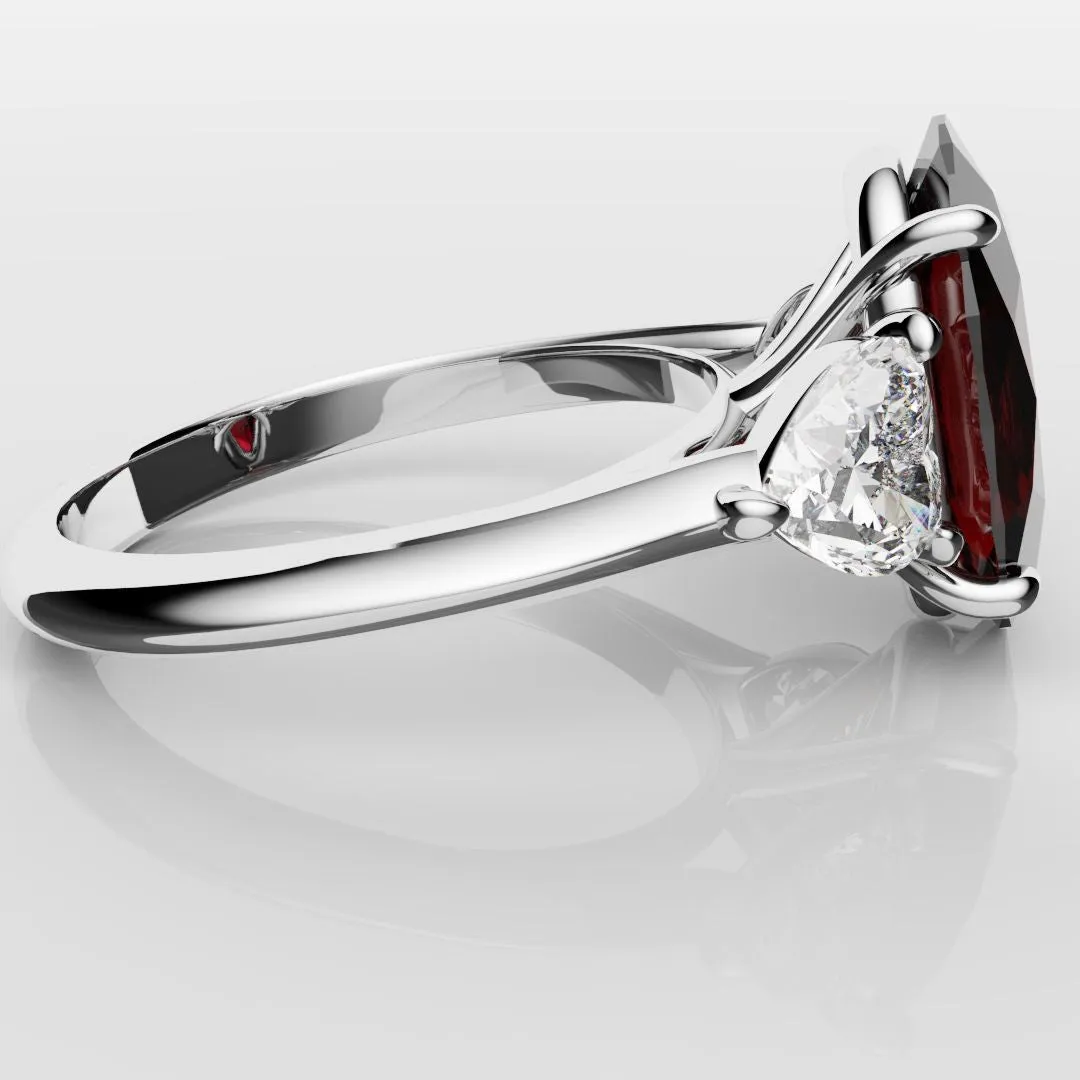Oval Ruby and Heart Diamond Trilogy Engagement Ring