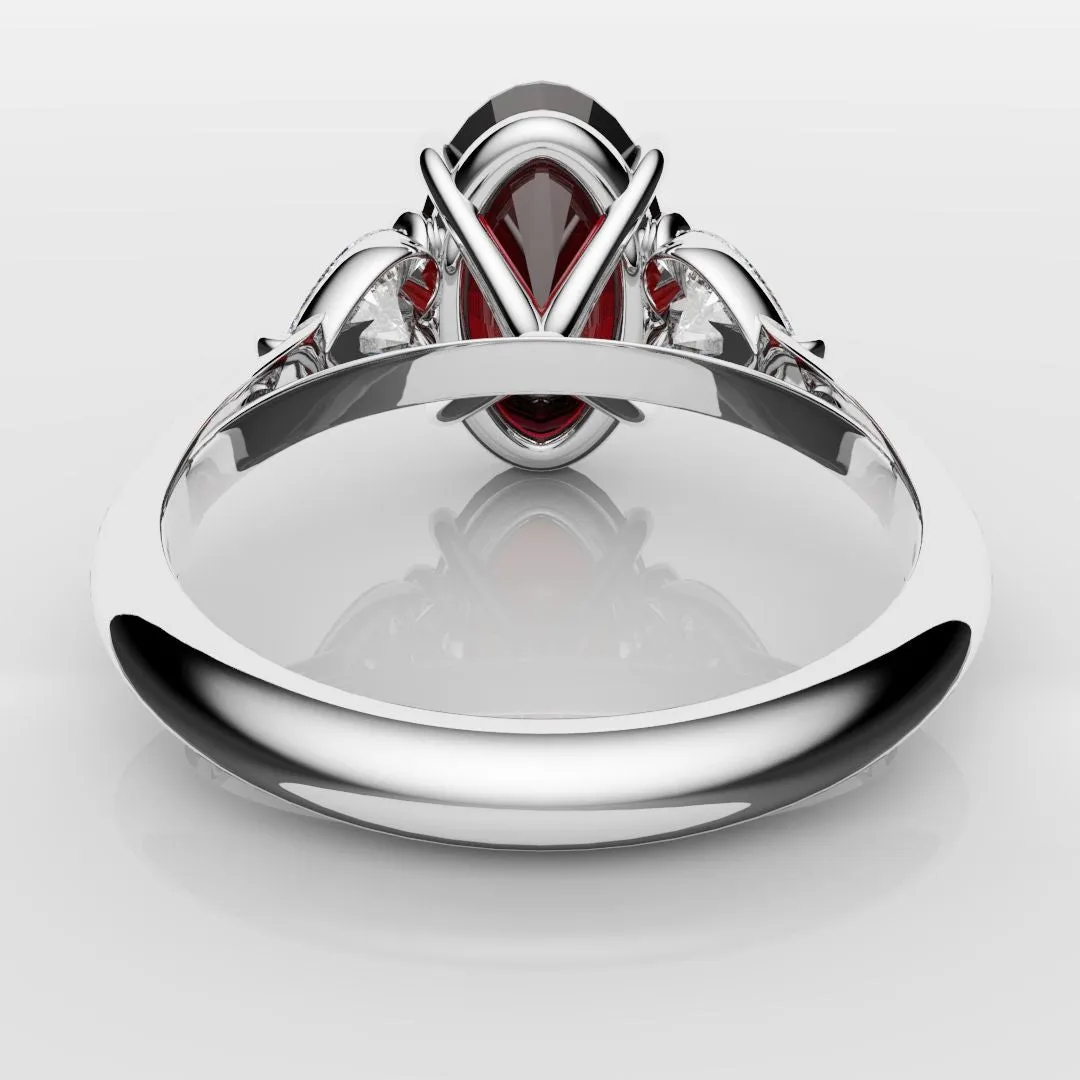 Oval Ruby and Heart Diamond Trilogy Engagement Ring