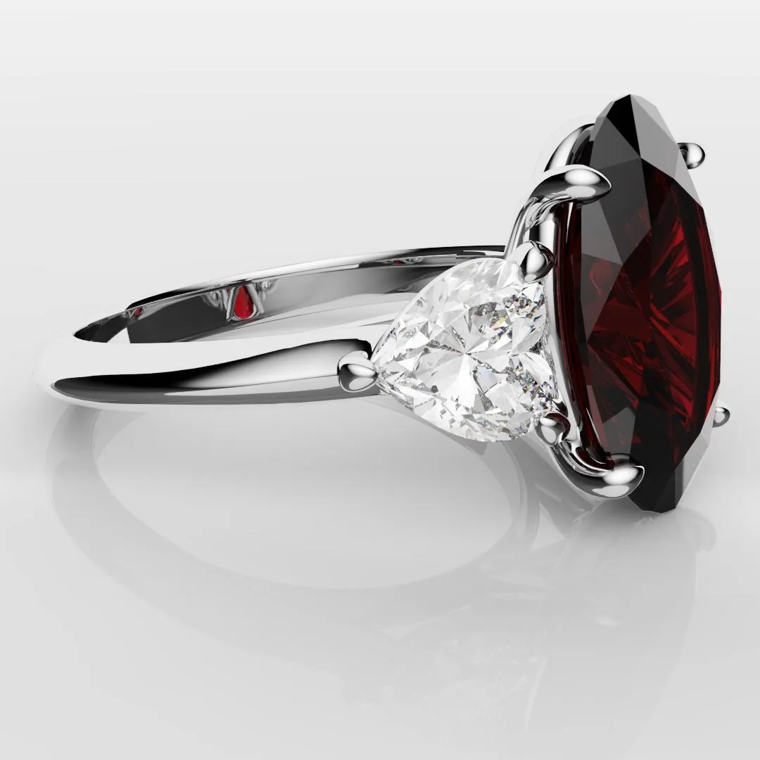 Oval Ruby and Heart Diamond Trilogy Engagement Ring