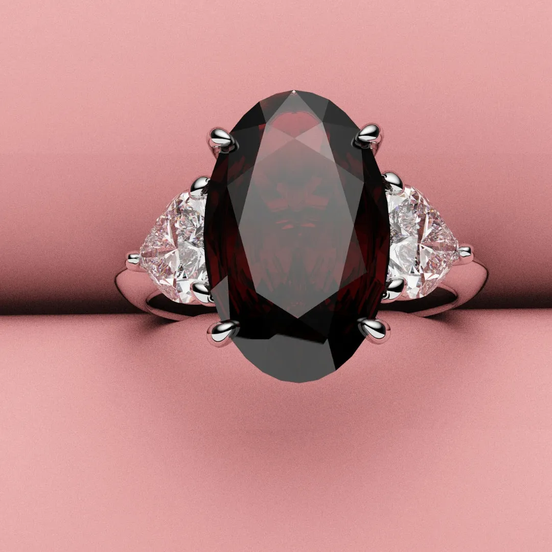 Oval Ruby and Heart Diamond Trilogy Engagement Ring