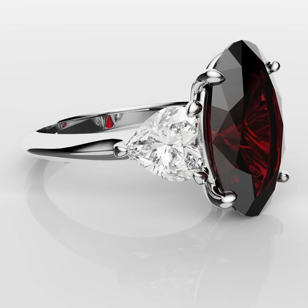 Oval Ruby and Heart Diamond Trilogy Engagement Ring