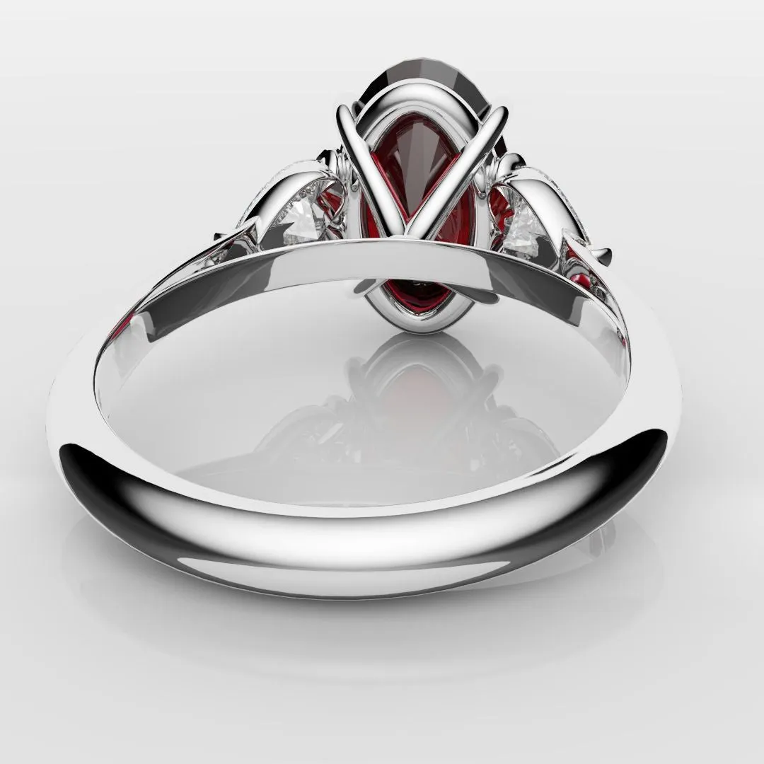 Oval Ruby and Heart Diamond Trilogy Engagement Ring