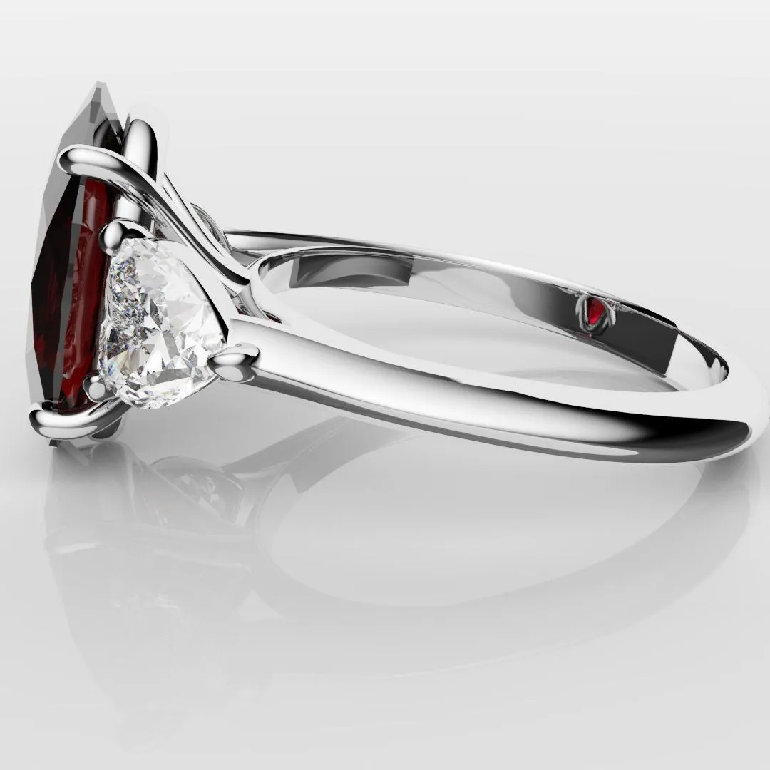 Oval Ruby and Heart Diamond Trilogy Engagement Ring