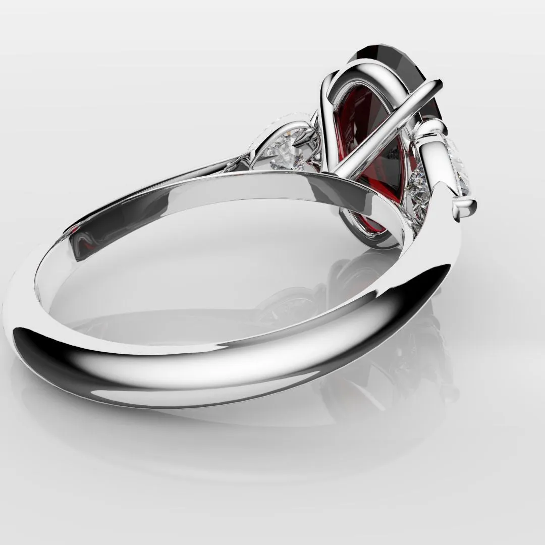Oval Ruby and Heart Diamond Trilogy Engagement Ring