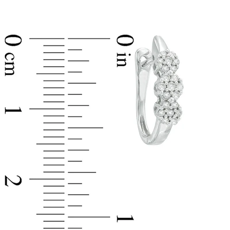 Pre-Owned Zales 1/4ct Diamond Flower Huggie Earrings in 10k White Gold