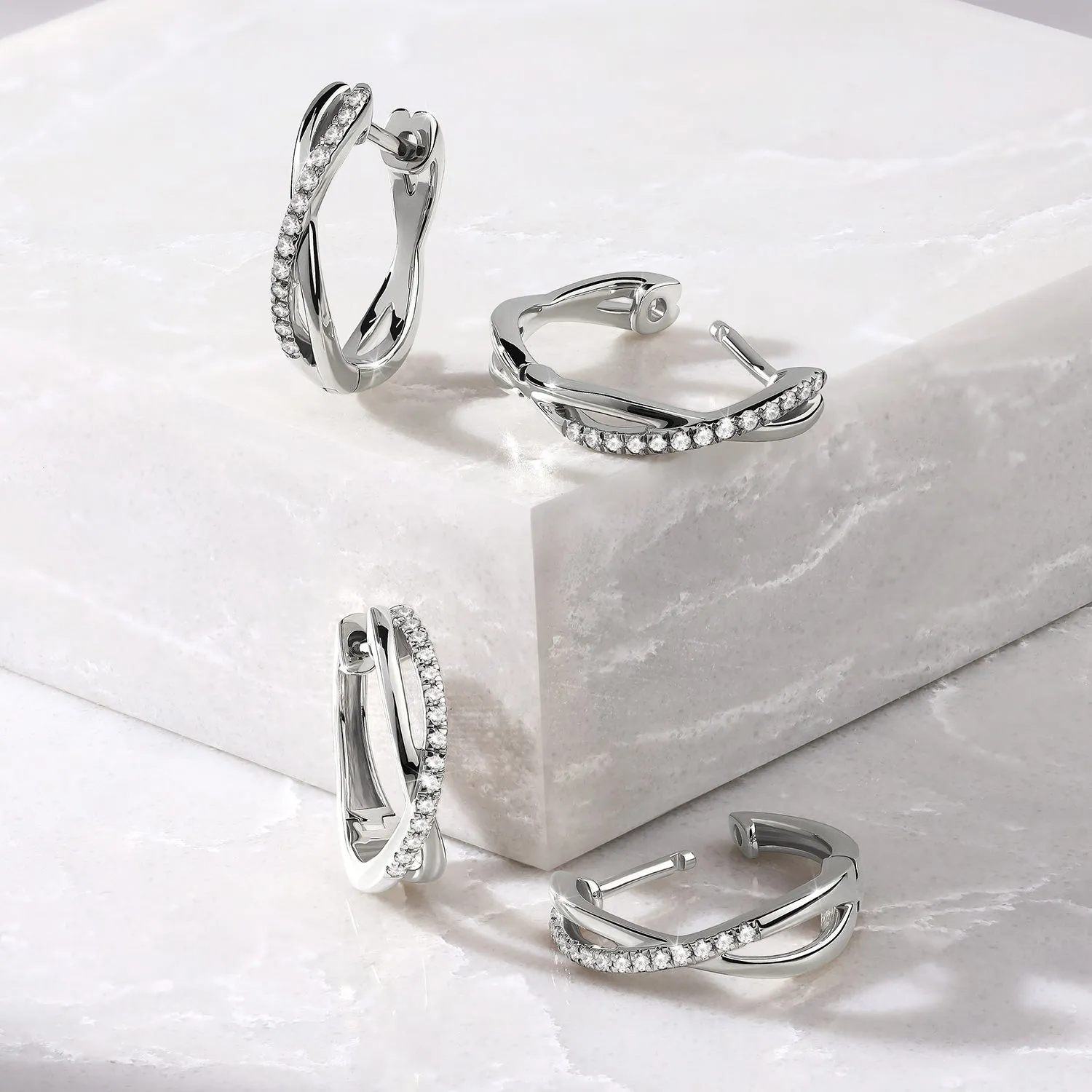 Radiant Twisted Huggie Hoops