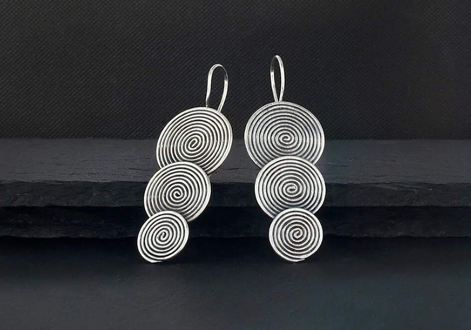 Tiered spiral disc drop earrings